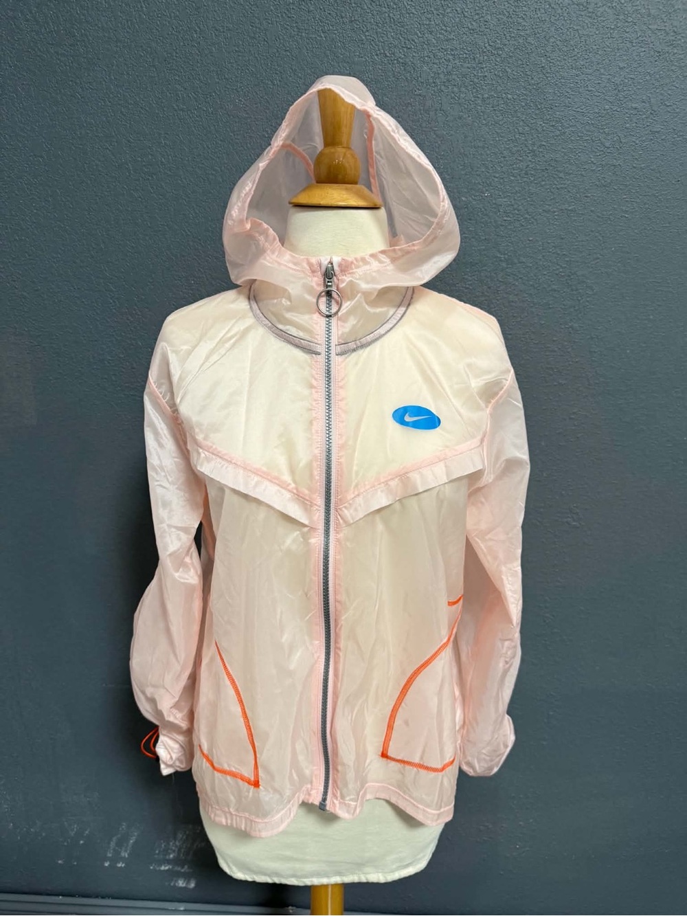 Nike Women’s Light Pink Hooded Rain Jacket with Neon Trim